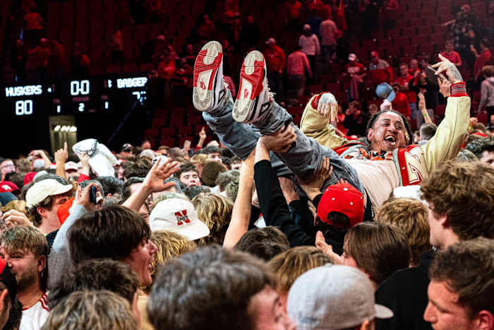 Feb 1, 2024; Lincoln, Nebraska, USA; Nebraska Cornhuskers fans celebrate after the Huskers defeated the Wisconsin Badgers at Pinnacle Bank Arena.